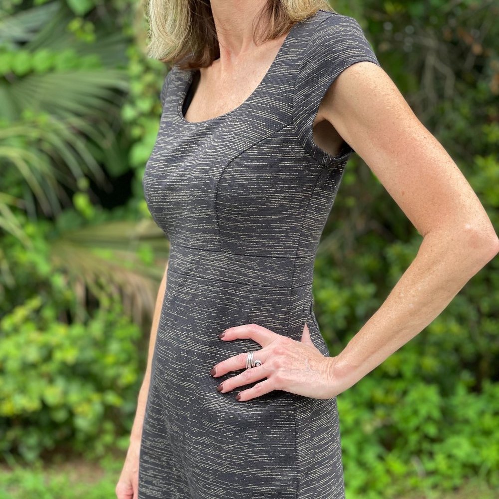 Attention black, metallic gold midi dress